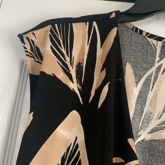 Light new beautiful black and tan low cut blouse. - Picture 3 of 4